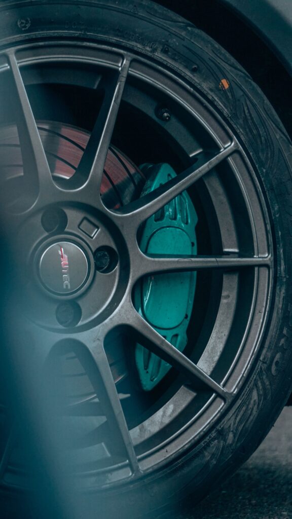 Alloy wheel and performance brake caliper close up Alloy wheel and performance brake caliper close up