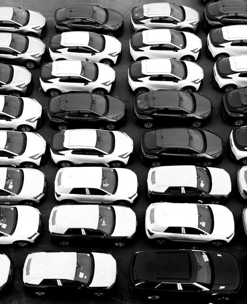 Aerial view of vehicles lined up on the dealership lot Aerial view of vehicles lined up on the dealership lot
